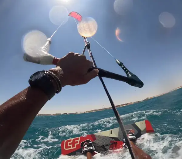 Riding a kiteboard on the Red Sea