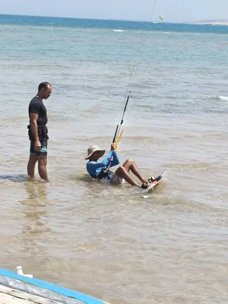Instructor watching a student practice water starts