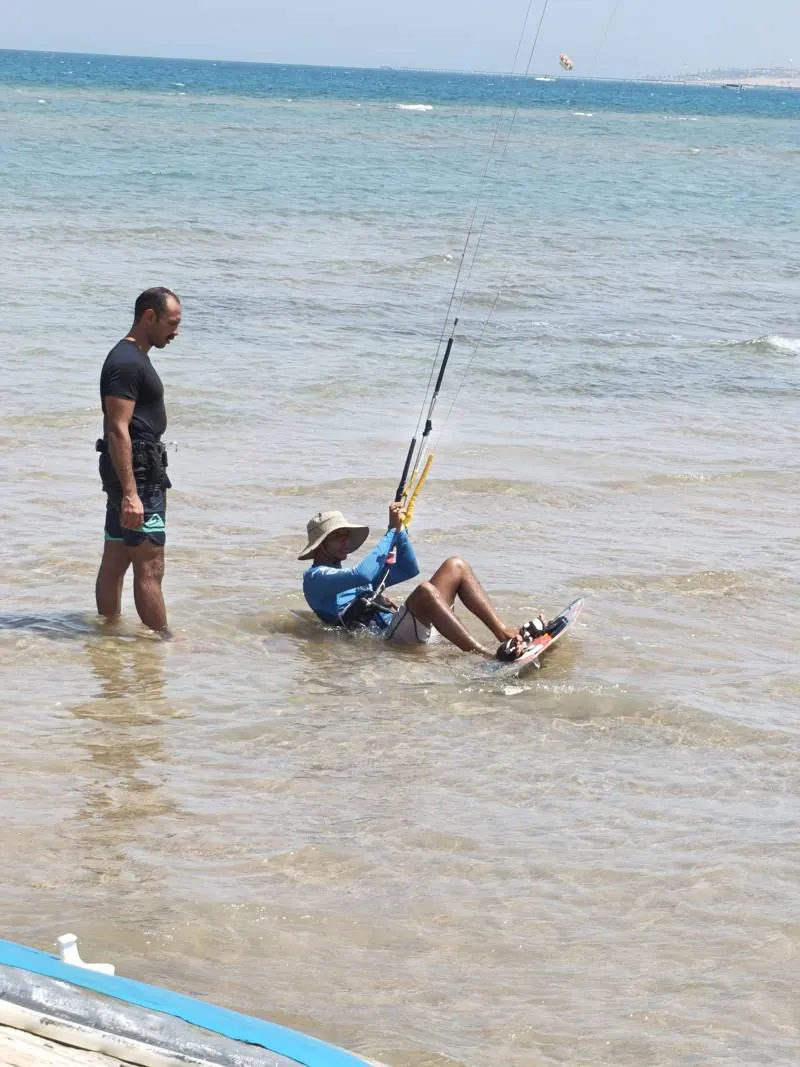 Instructor watching a student practice water starts